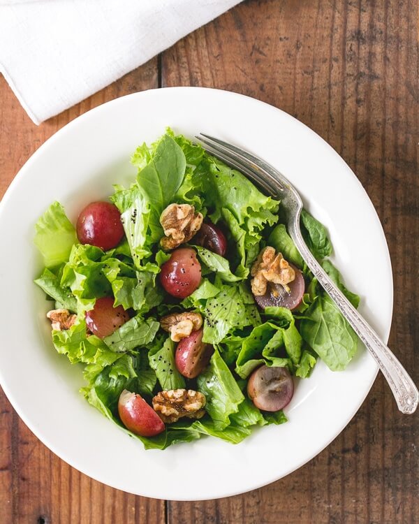 Grape salad with walnuts and poppyseed dressing