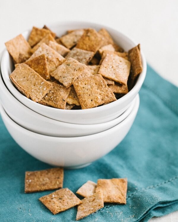 Whole Wheat Crackers in stack of white bowls