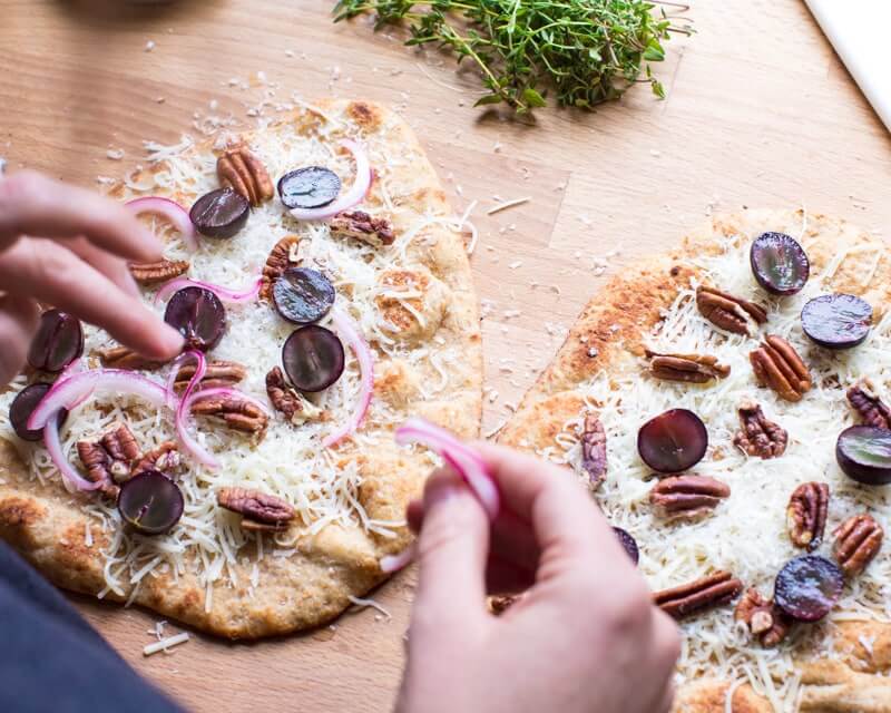 Pecan and grape pizza