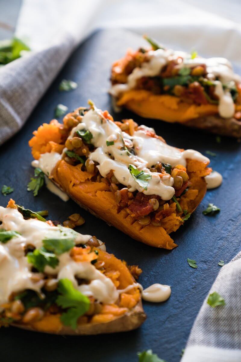 Healthy baked sweet potato with Moroccan lentils