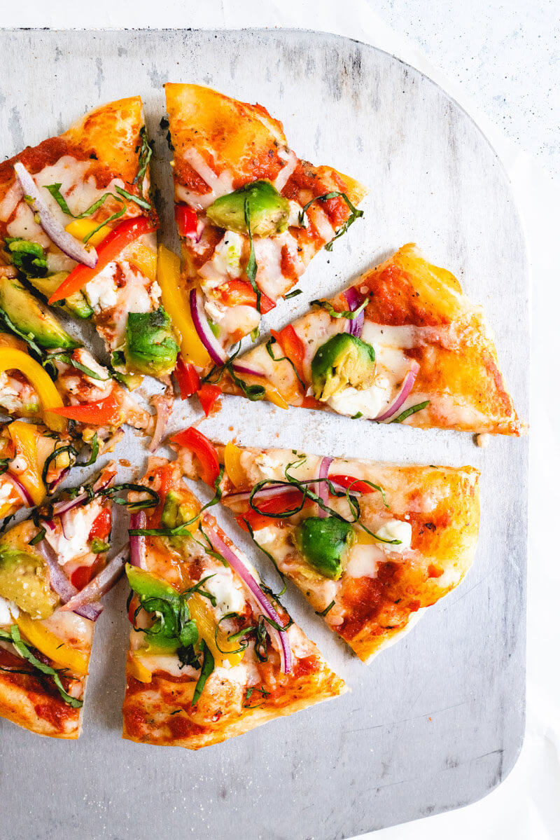 Vegetable toppings: avocado, red onion, bell pepper, basil