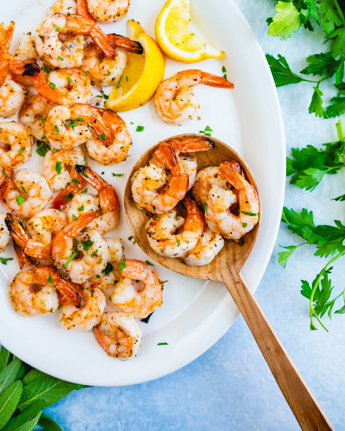 Step 3: Season the grilled shrimp with lemon.