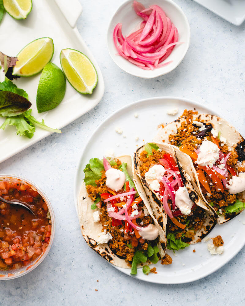 Tacos topped with salsa