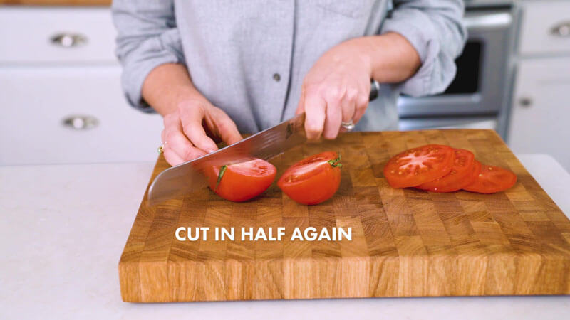 How to Cut a Tomato | Cut the tomato into quarters