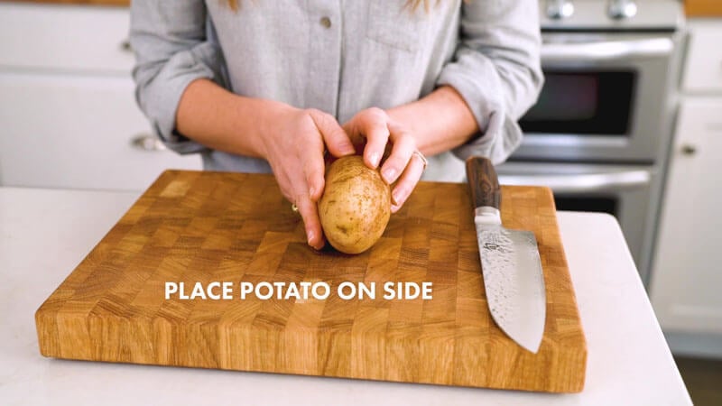 How to Cut Potato Wedges | Place the potato on its side