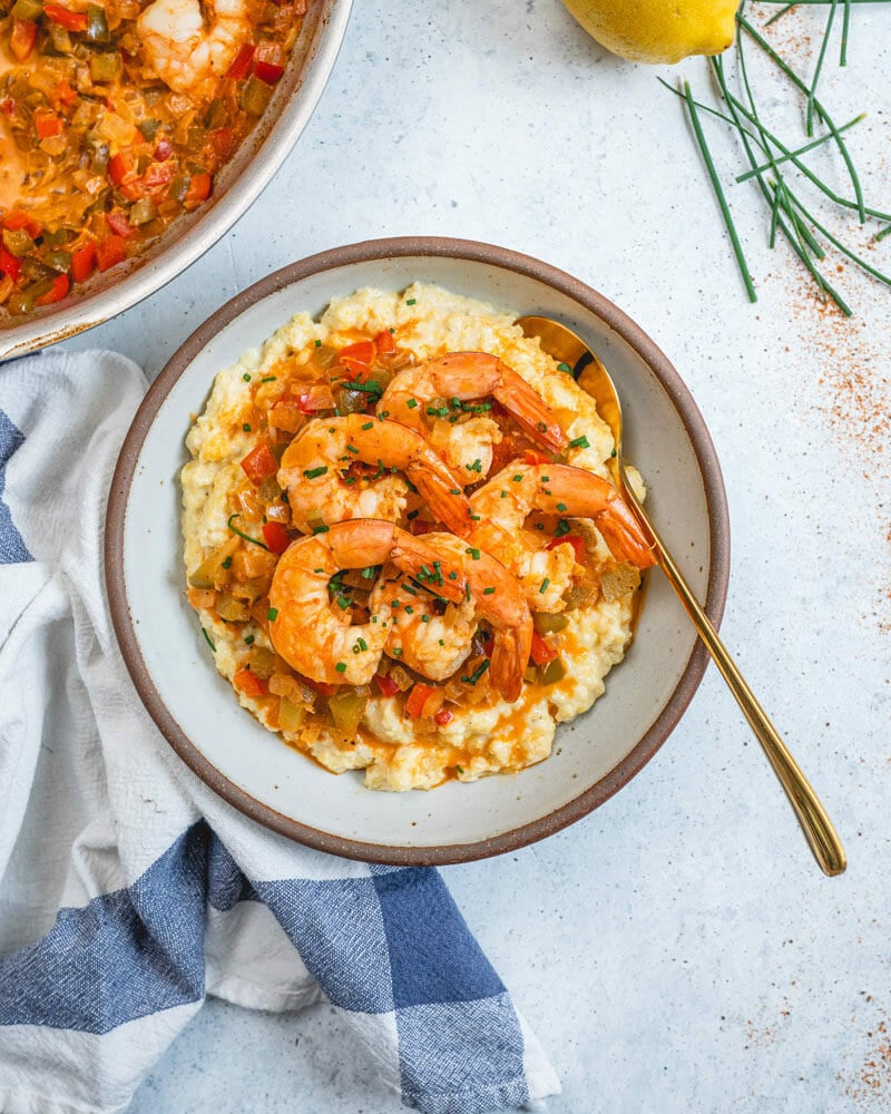 Cajun shrimp and grits in bowl. 