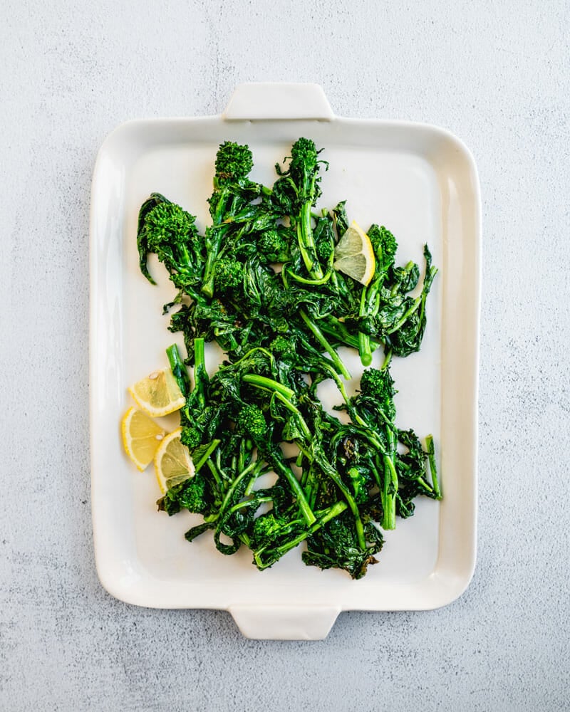 Step 3: Stir in lemon zest to the broccoli rabe.