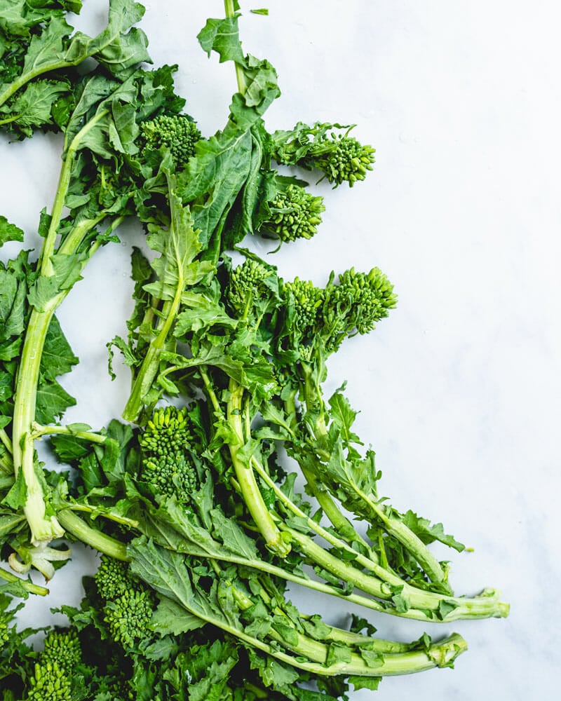 Step 1: Chop the stem of the broccoli rabe.