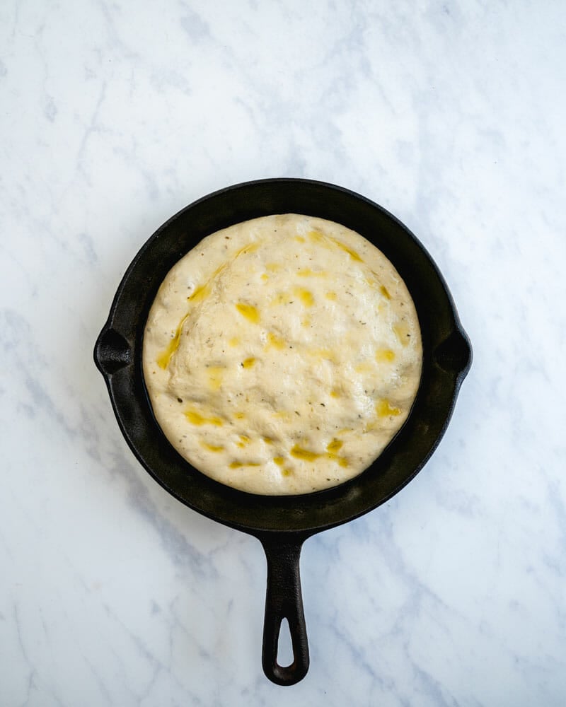 Dough in cast iron skillet