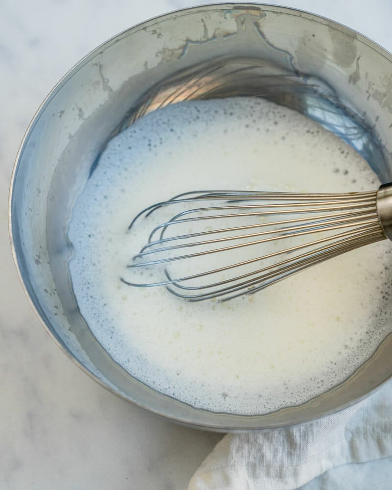How to froth milk with a whisk