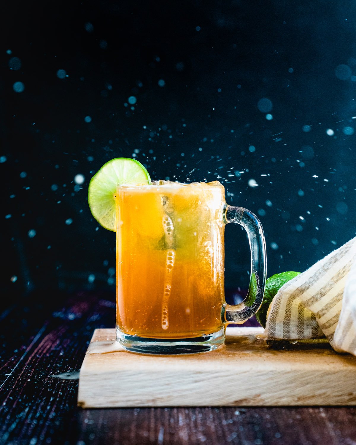 Beer Margarita in glass mug with lime.