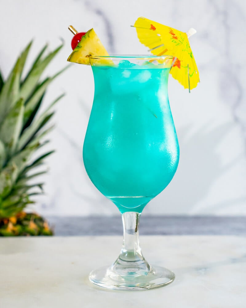 Blue Hawaii drink with drink umbrella