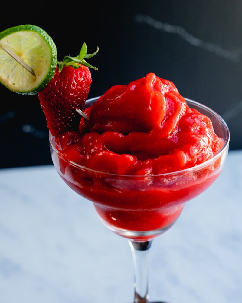Virgin Strawberry Daiquiri Recipe in glass with strawberry garnish