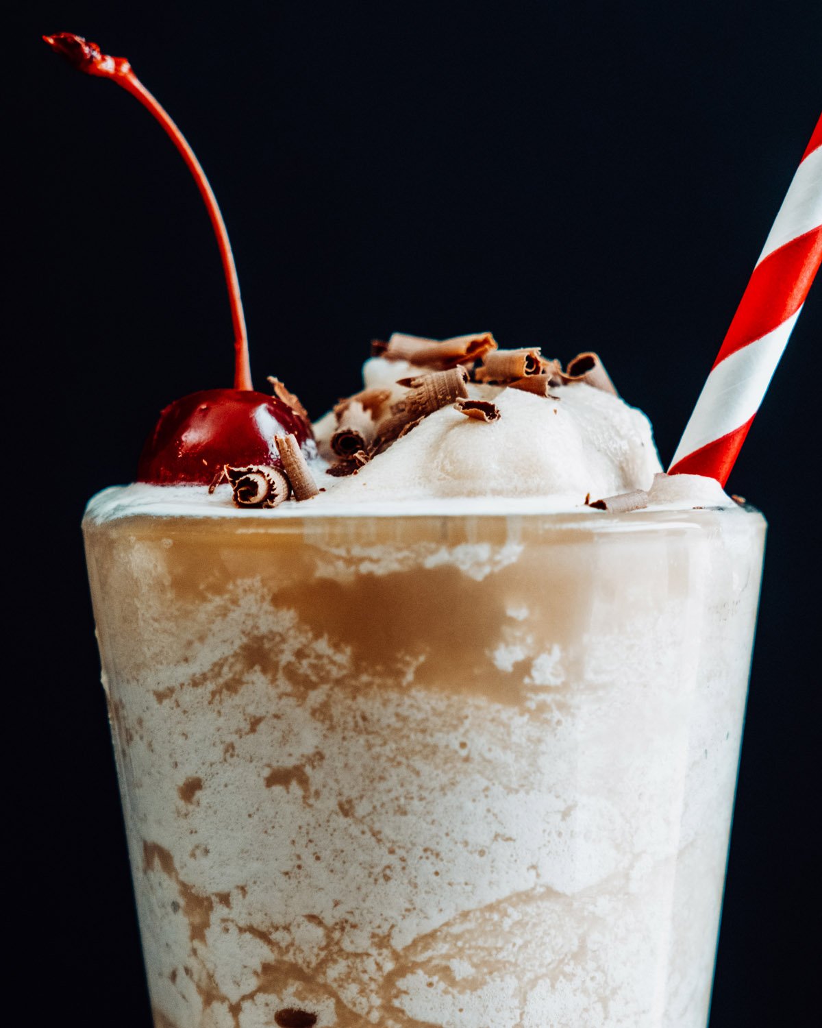 Bushwacker Drink in glass with cherry and chocolate shavings
