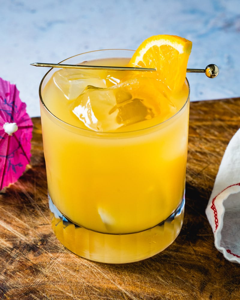 Brass Monkey drink in glass with umbrella