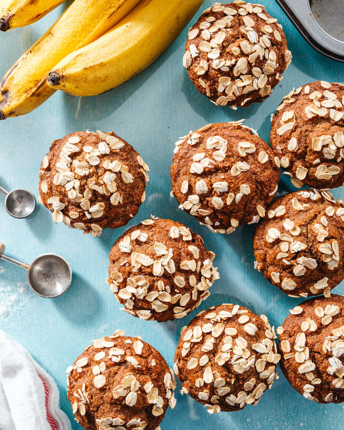 Healthy banana muffins with bananas and measuring spoons