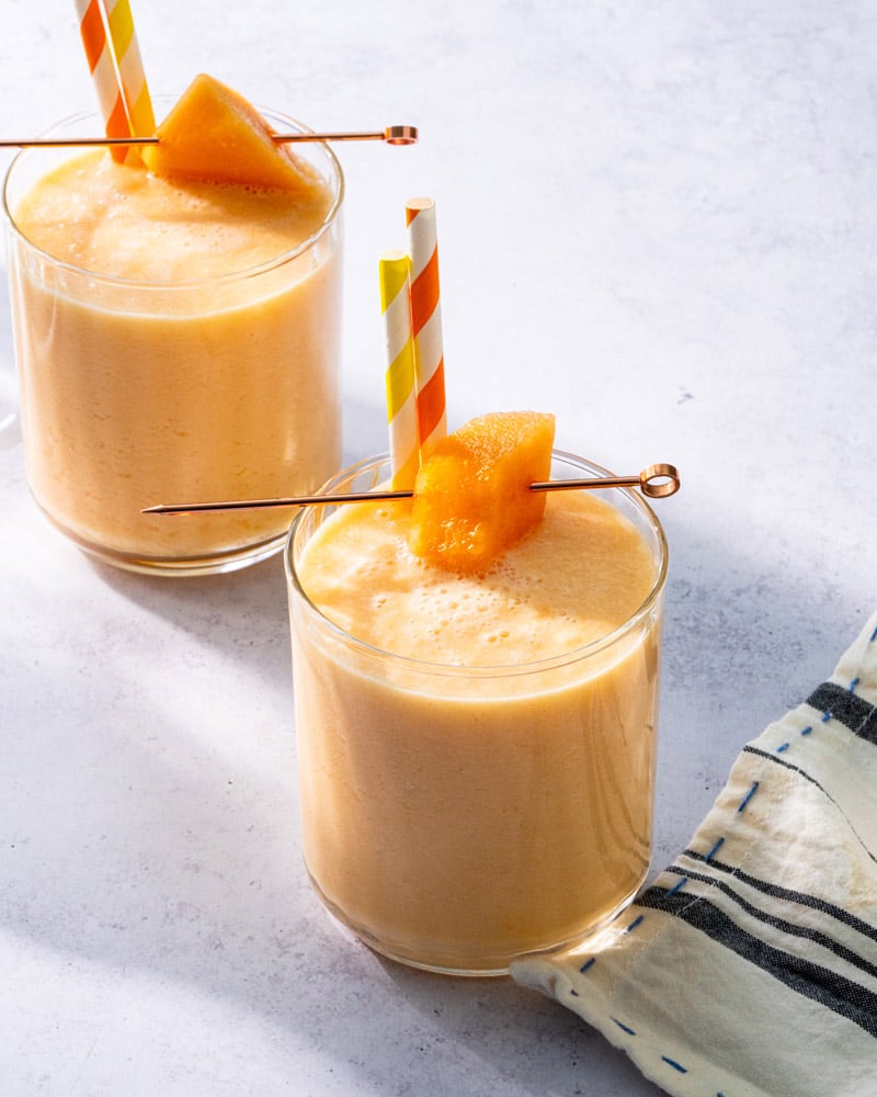 Cantaloupe smoothie in two glasses