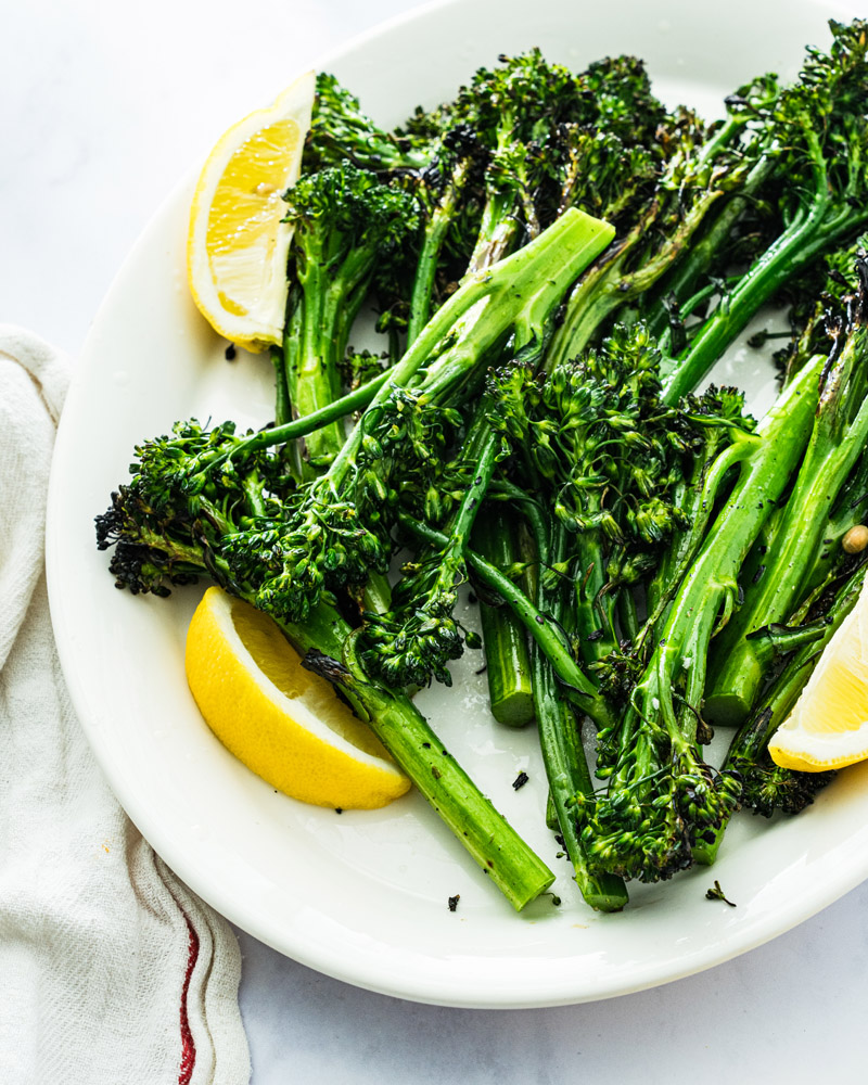 Step 3: Spritz the grilled broccolini with lemon juice. 