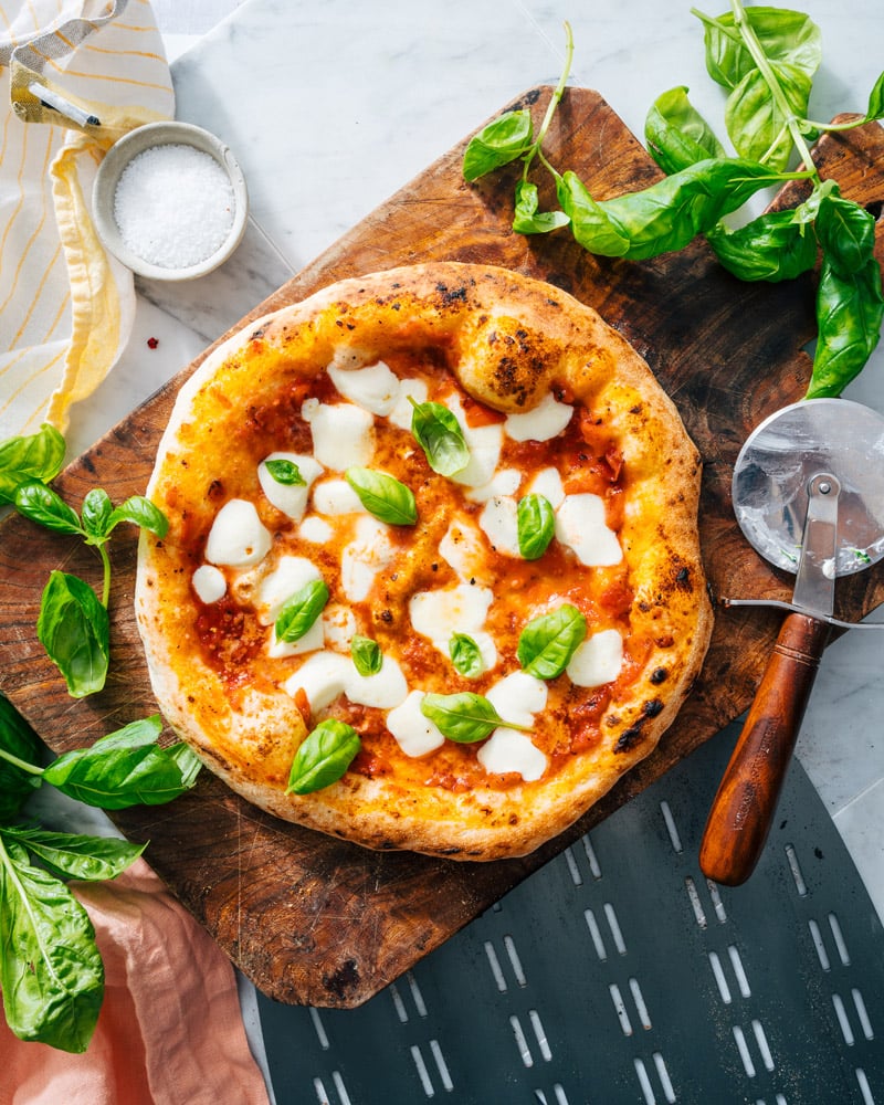 Margherita pizza recipe with basil and mozzarella cheese.