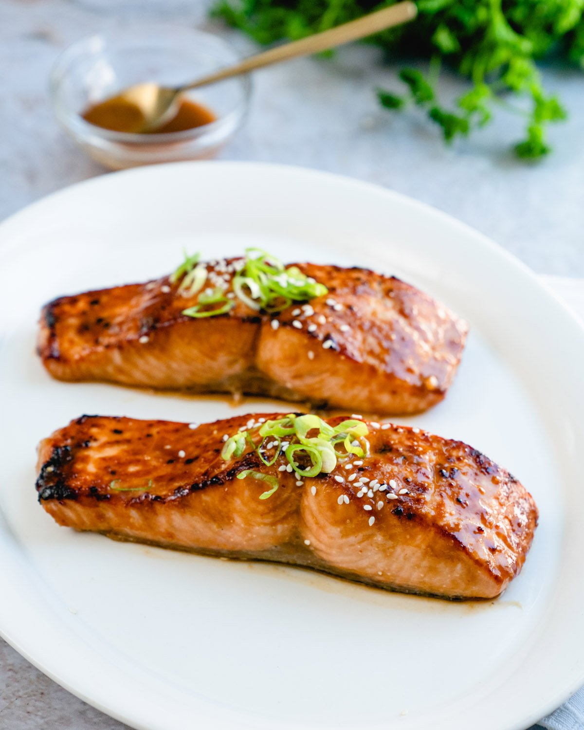 Miso Salmon with glaze in background.