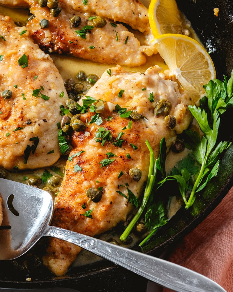 Chicken Piccata recipe in pan with capers and lemon butter sauce