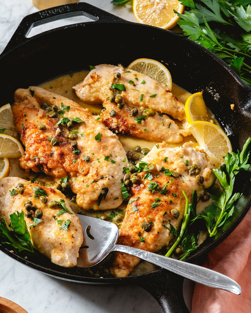Chicken Piccata recipe in pan with capers and lemon butter sauce