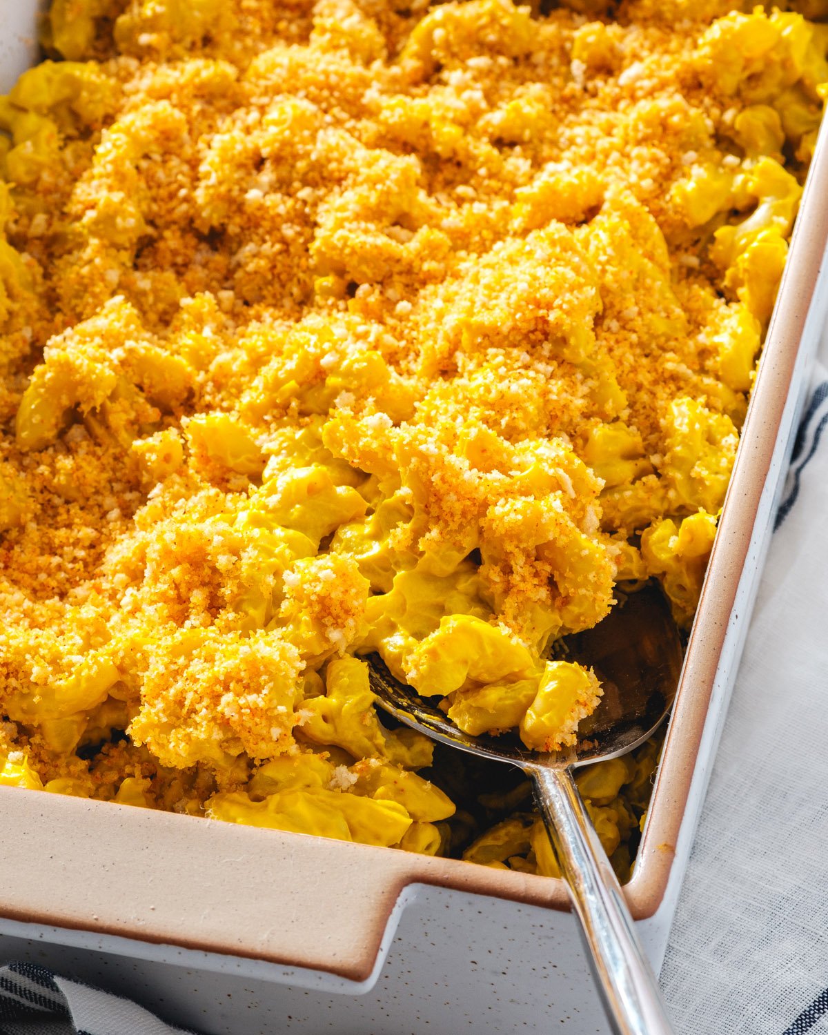 Vegan Mac and Cheese recipe in pan with breadcrumb topping