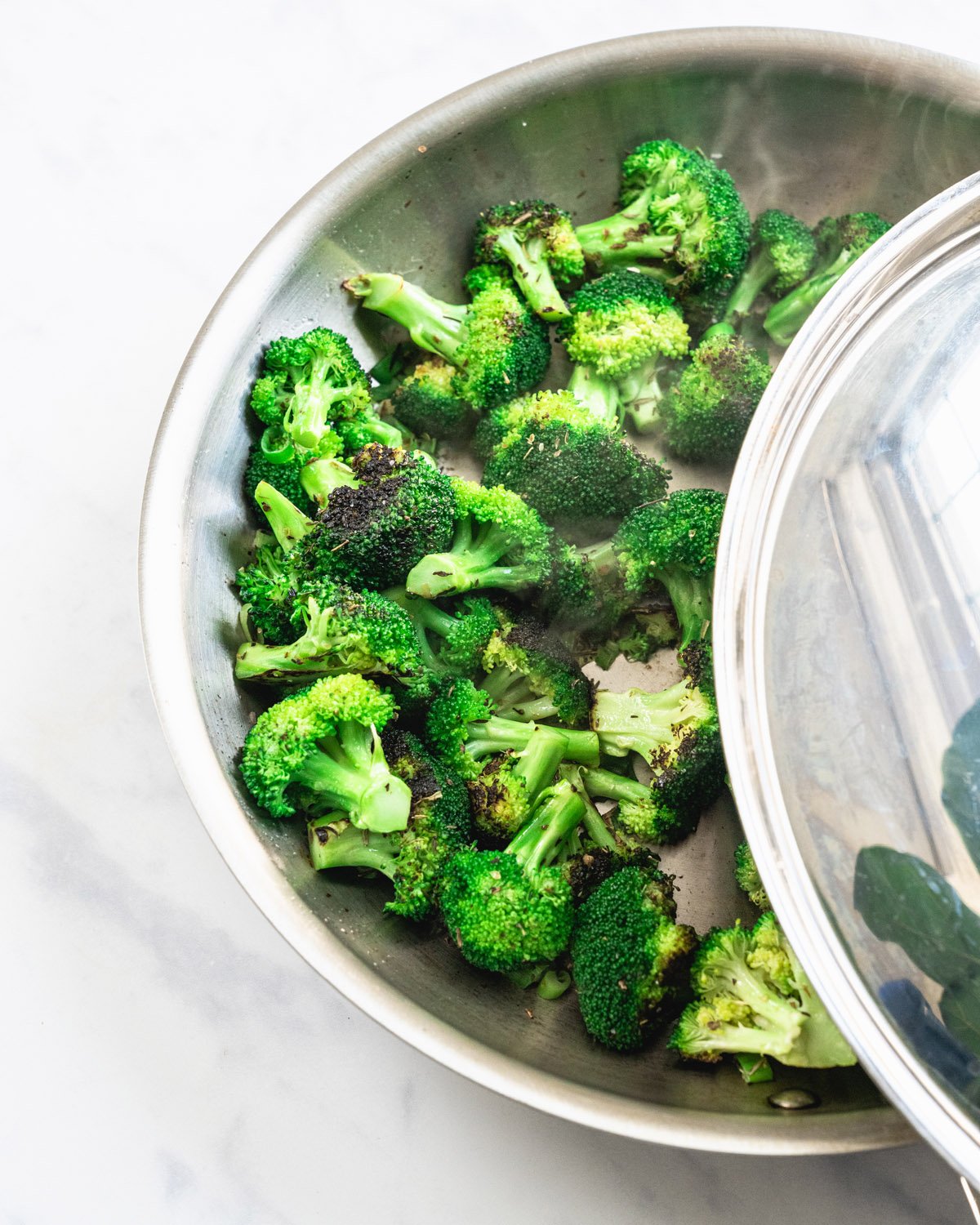 Step 3: Cover the broccoli and steam. 