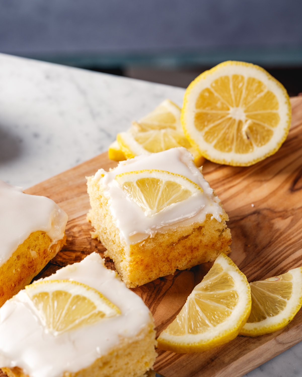 Lemon Cake recipe with icing and lemon slice garnish.
