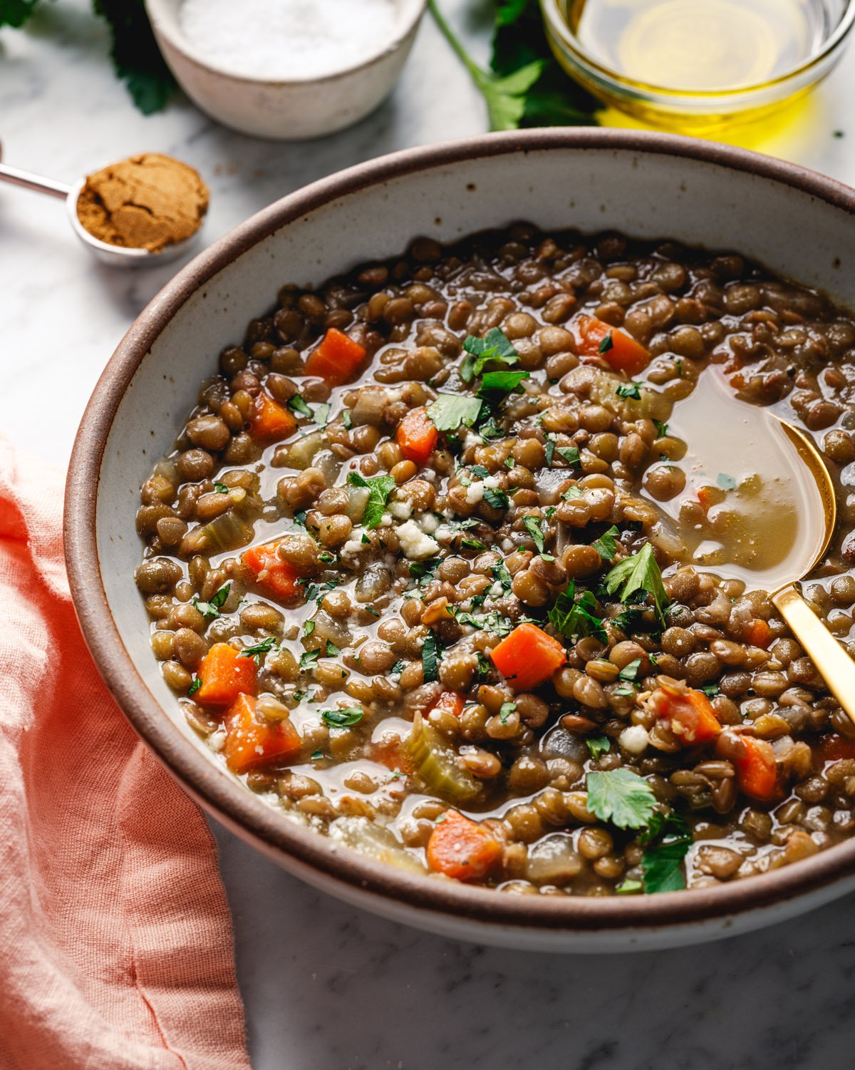 Lentil Soup Recipe in bowl with spoon.