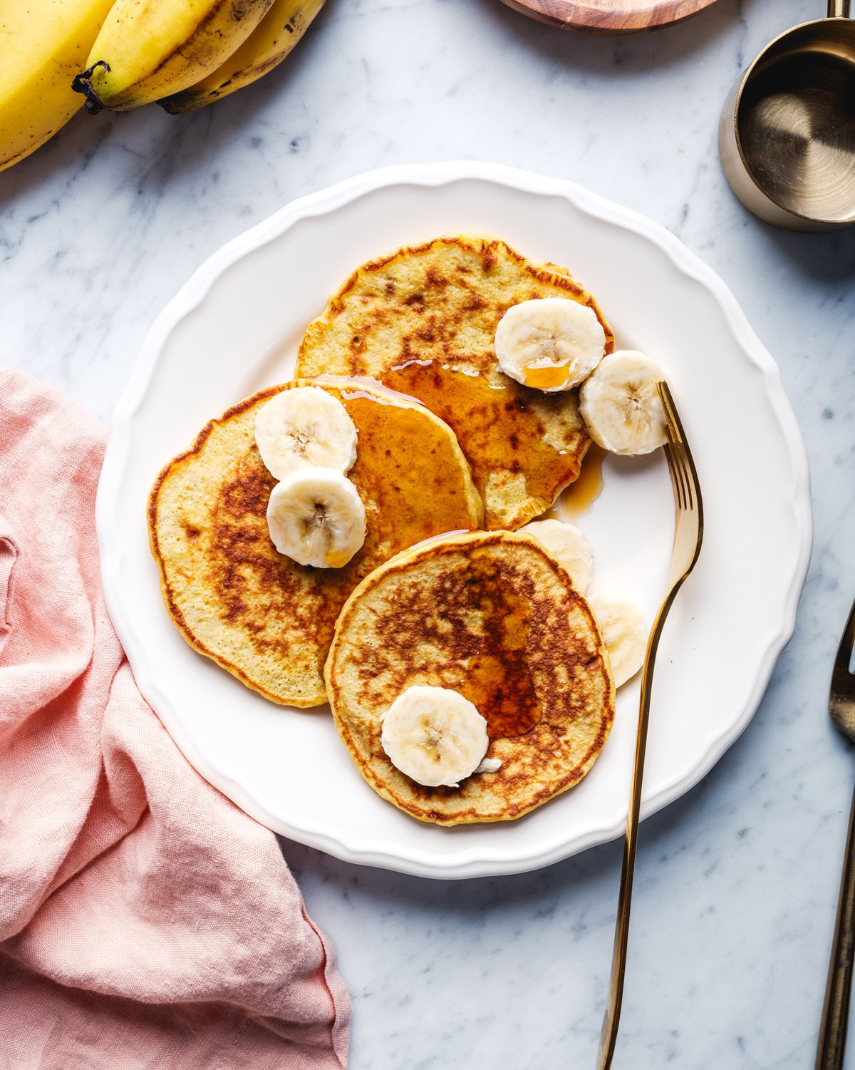 3 ingredient banana pancakes on place with fork.