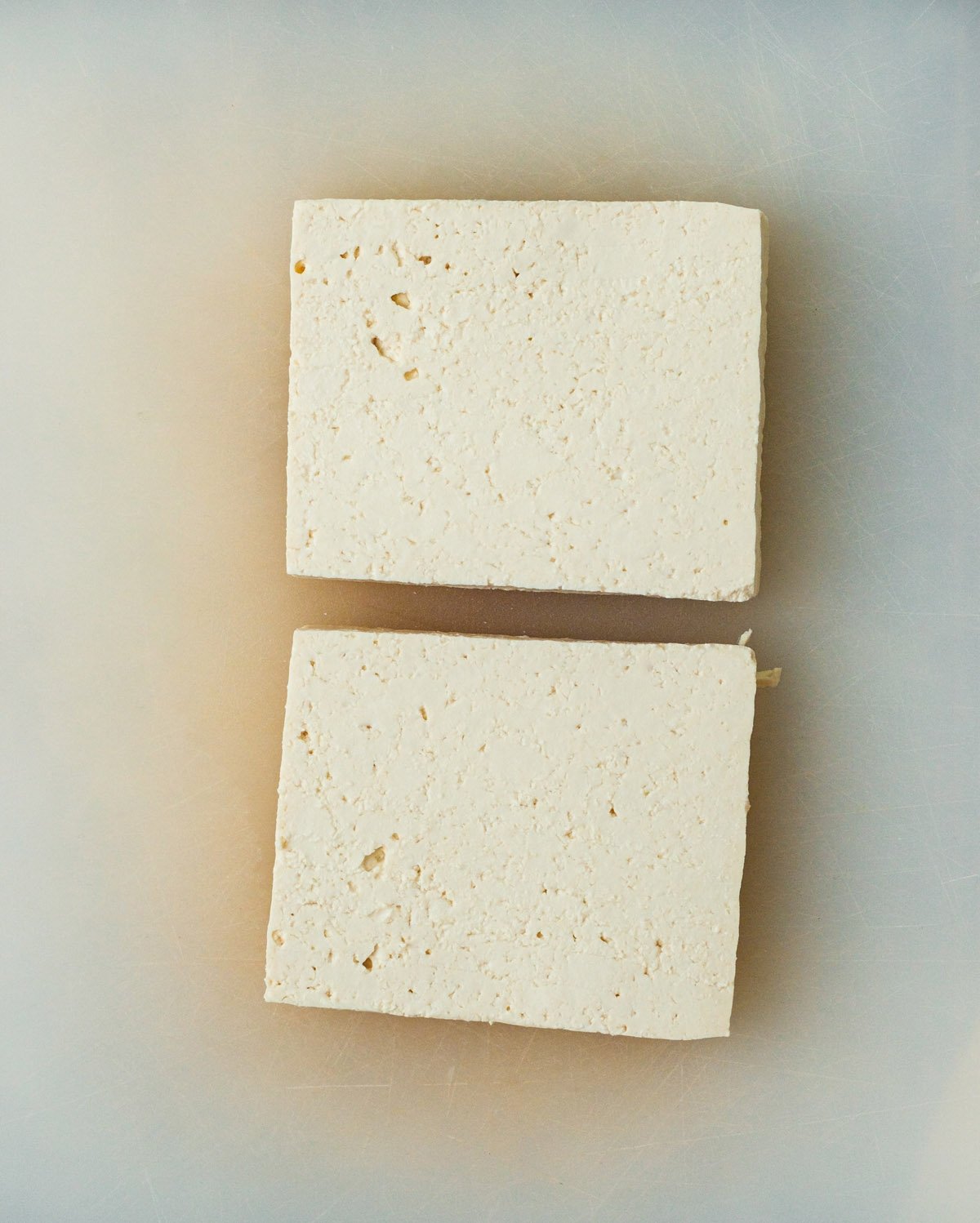 Step 1: Slice the tofu and press it.
