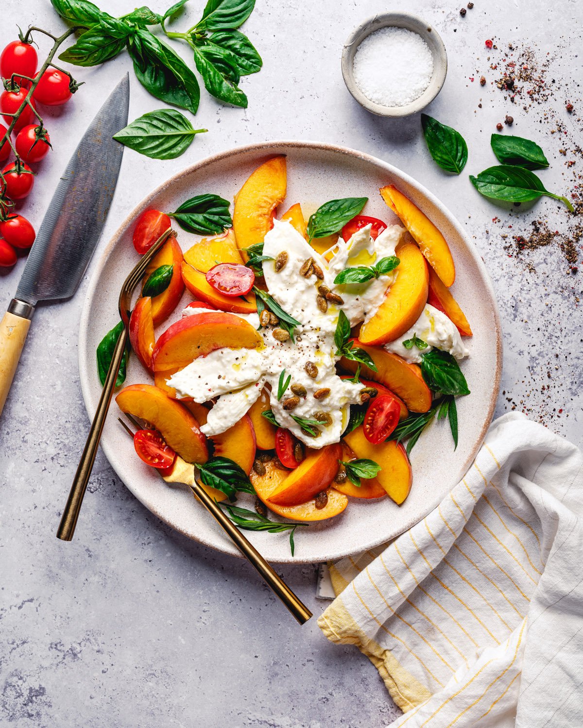 Peach Burrata Salad on plate.