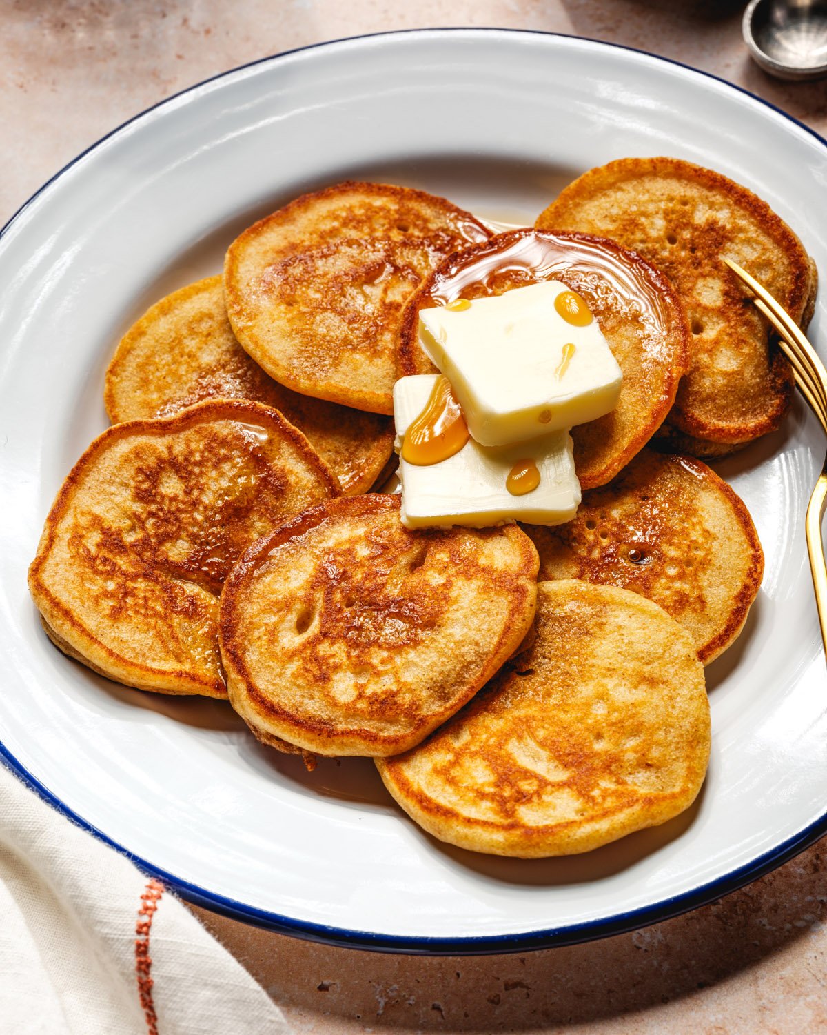 Silver Dollar Pancakes with butter and fork