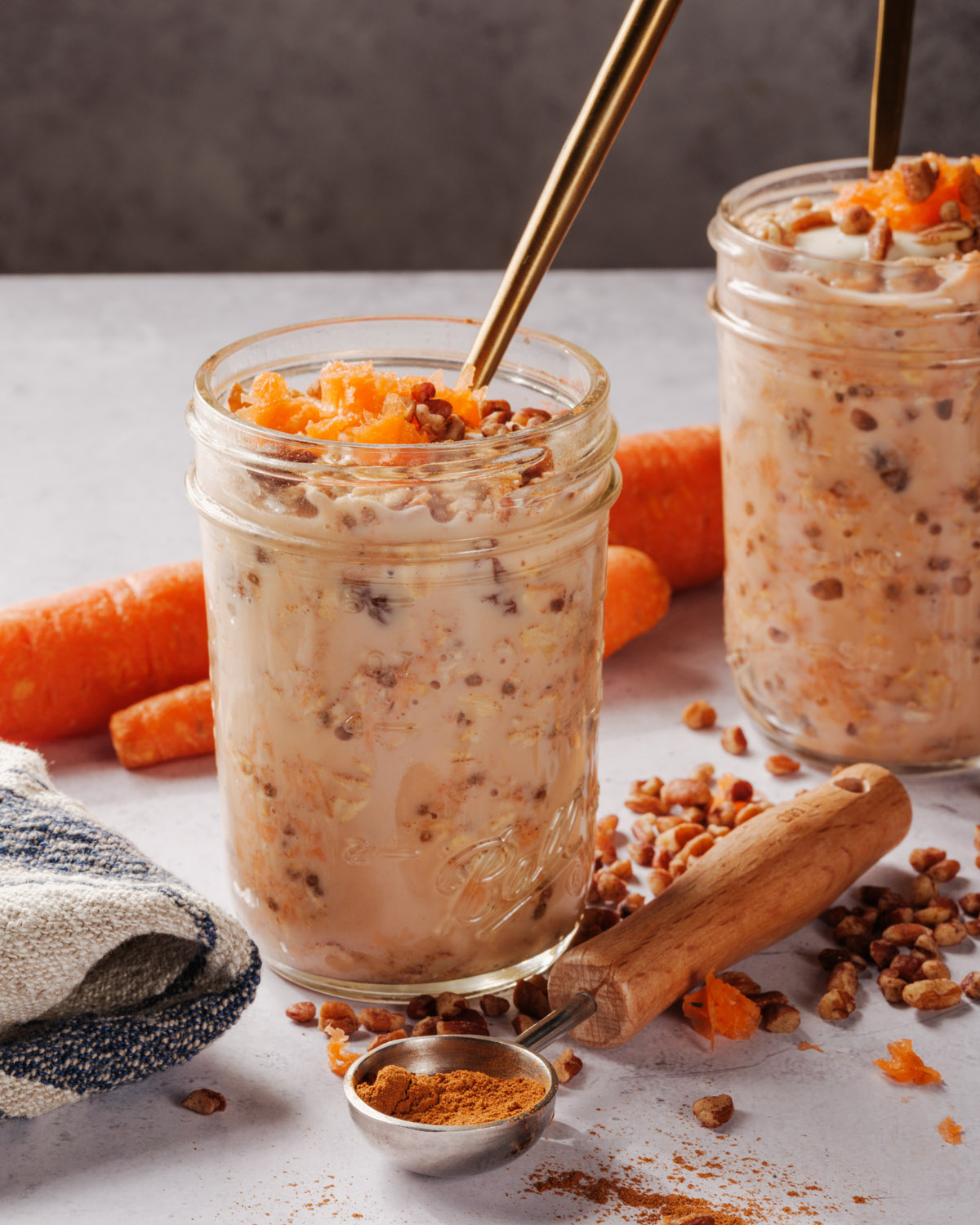 Carrot Cake Overnight Oats in jar with spoon
