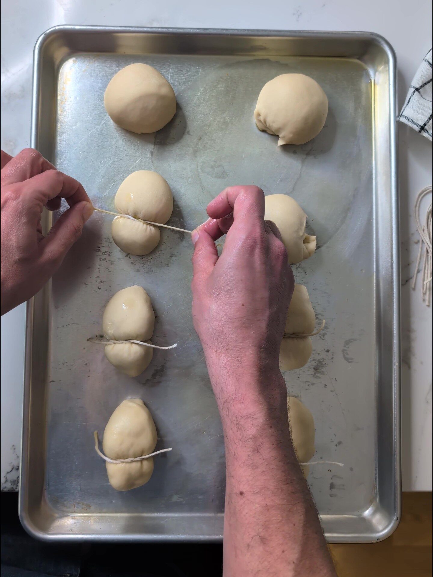 Bunny bread step 2: Use kitchen twine to create the head shape.