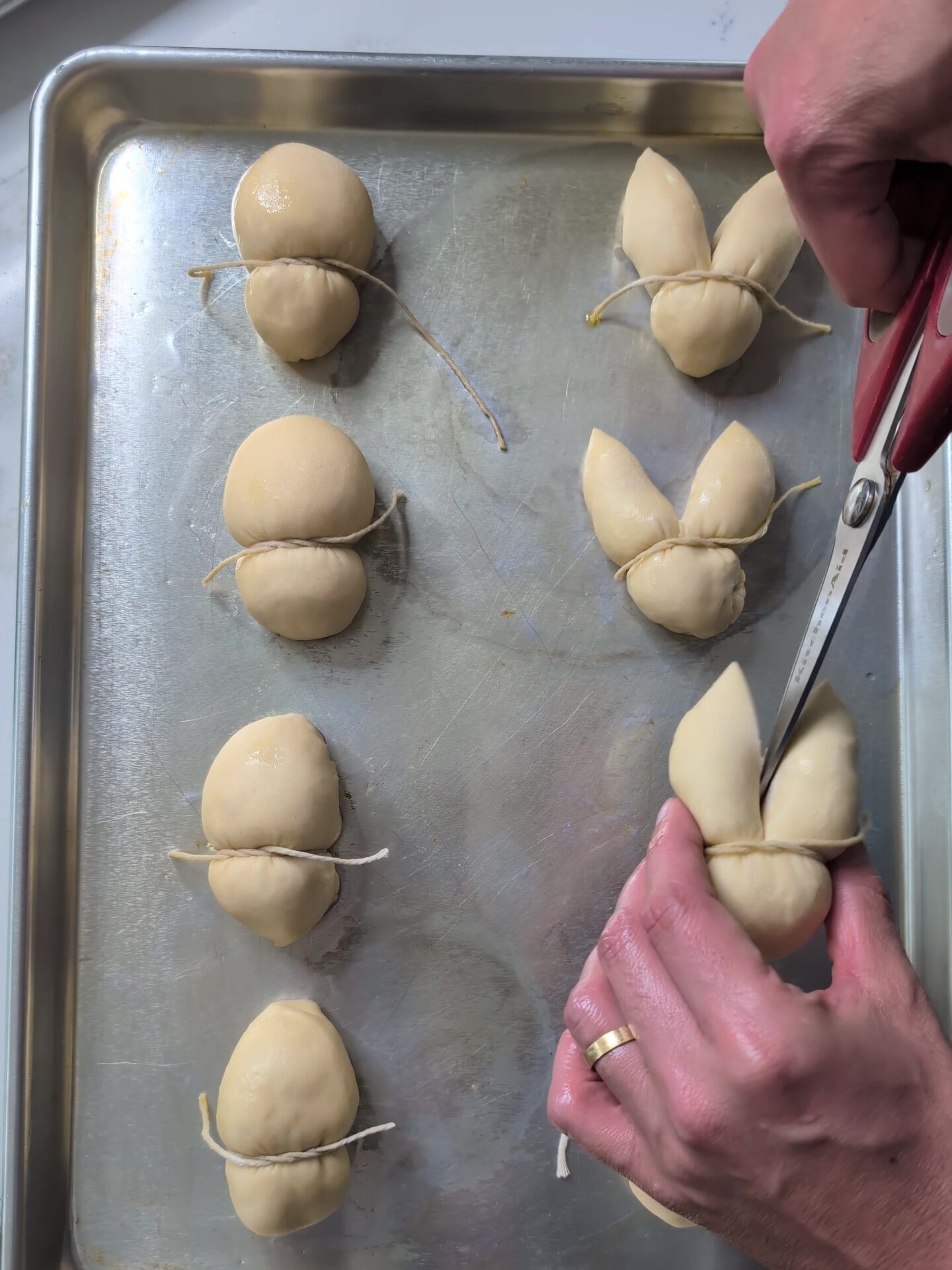 Bunny bread step 3: Use kitchen shears to cut the ears.