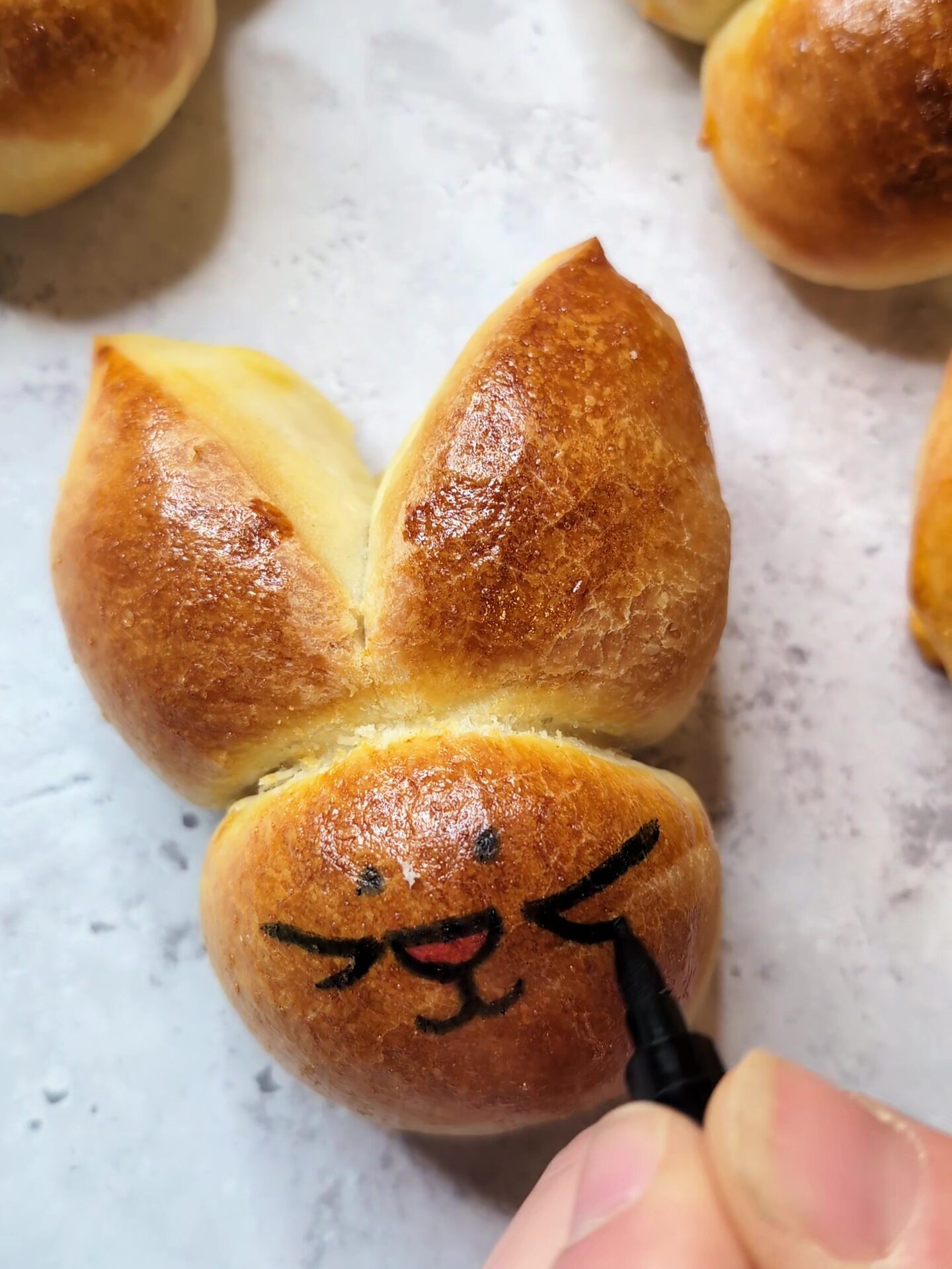 Bunny bread step 5: Add a face with food coloring markers