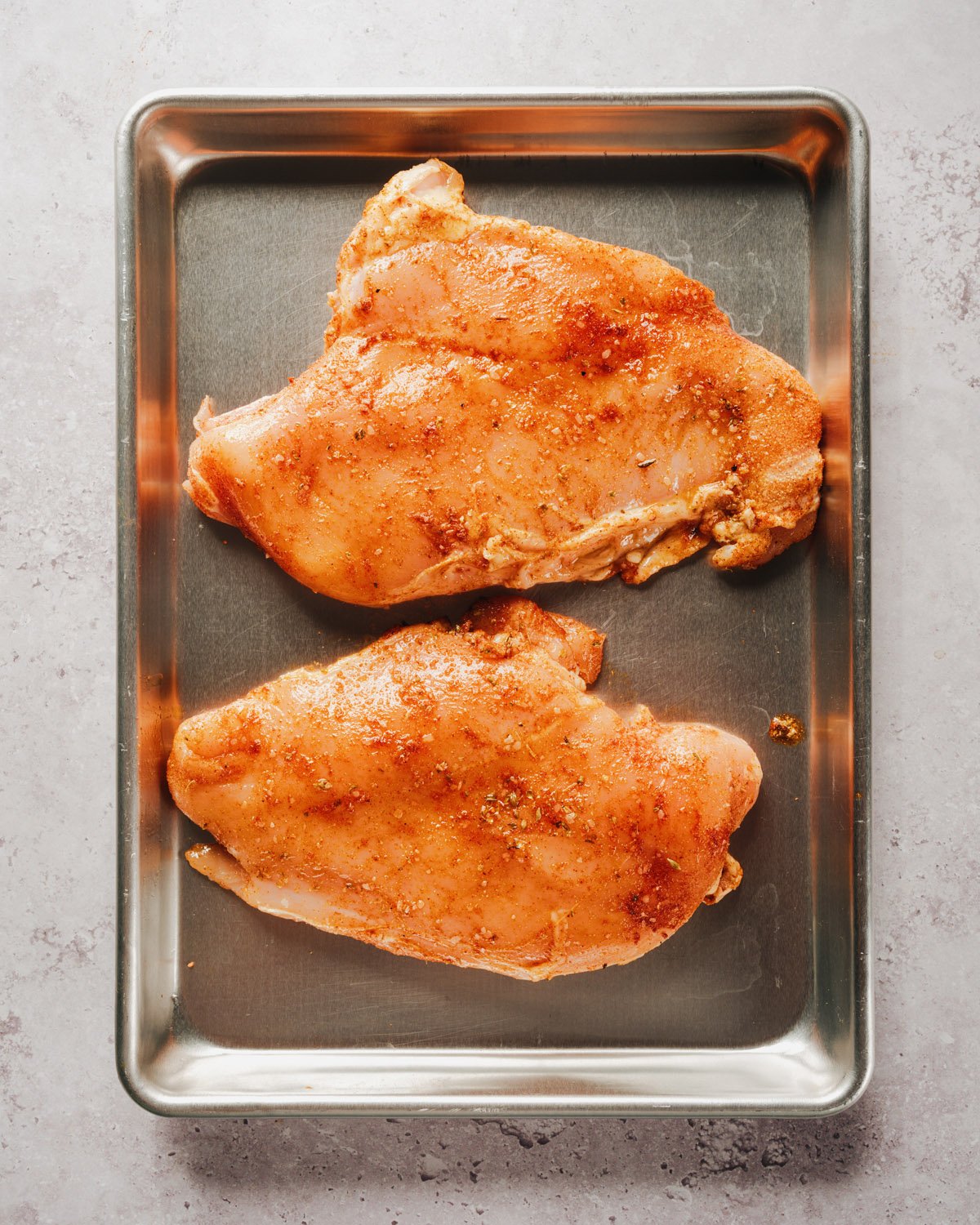 Step 1 pound and season the chicken breast. 