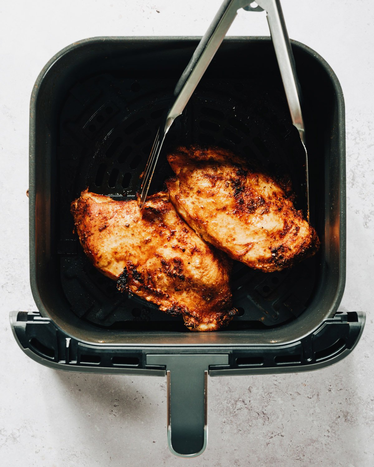 Step 2 Air fry the chicken for 15 to 20 minutes