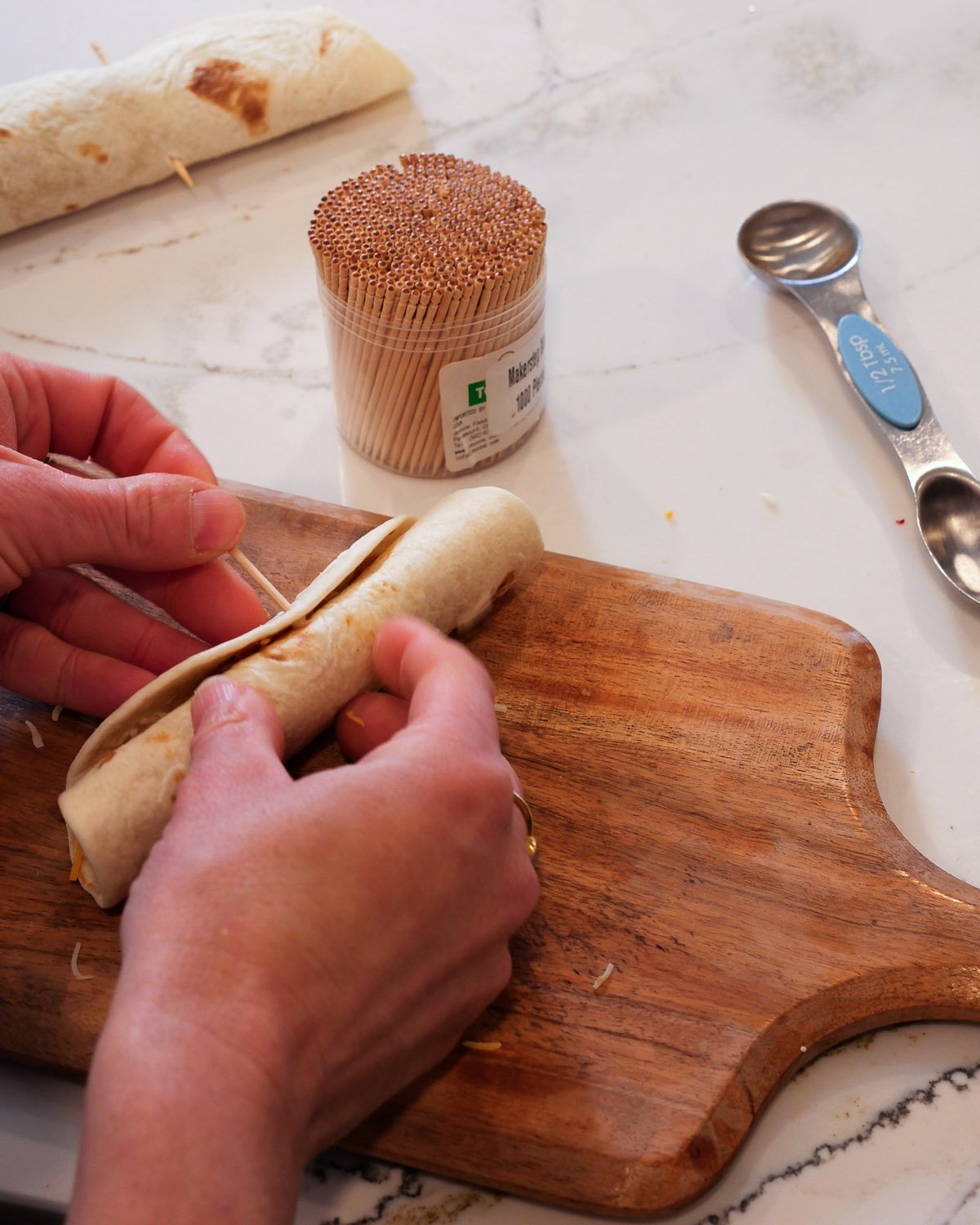 Roll up and add toothpick