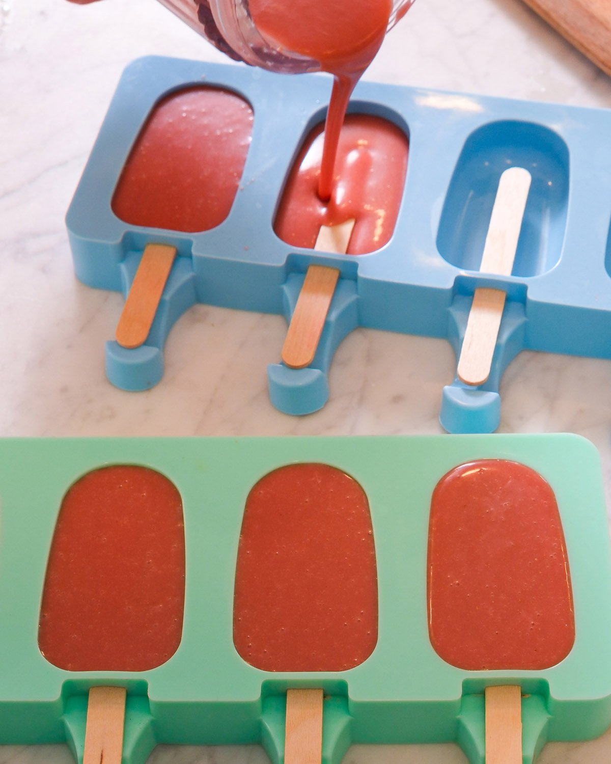 Filling the popsicle molds